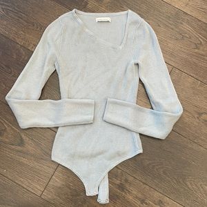 ASYMMETRICAL KNIT BODYSUIT